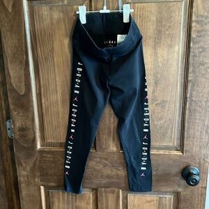 Girls black Jordan leggings size medium